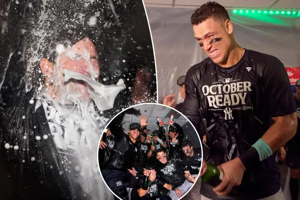 See the Yankees’ champagne-filled clubhouse celebration after clinching MLB playoff berth